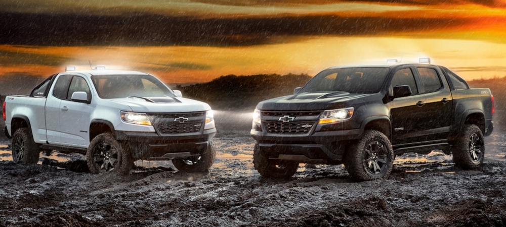 2018 Chevrolet Colorado ZR2 Dusk and Midnight edition black and white pickup truck in muddy field
