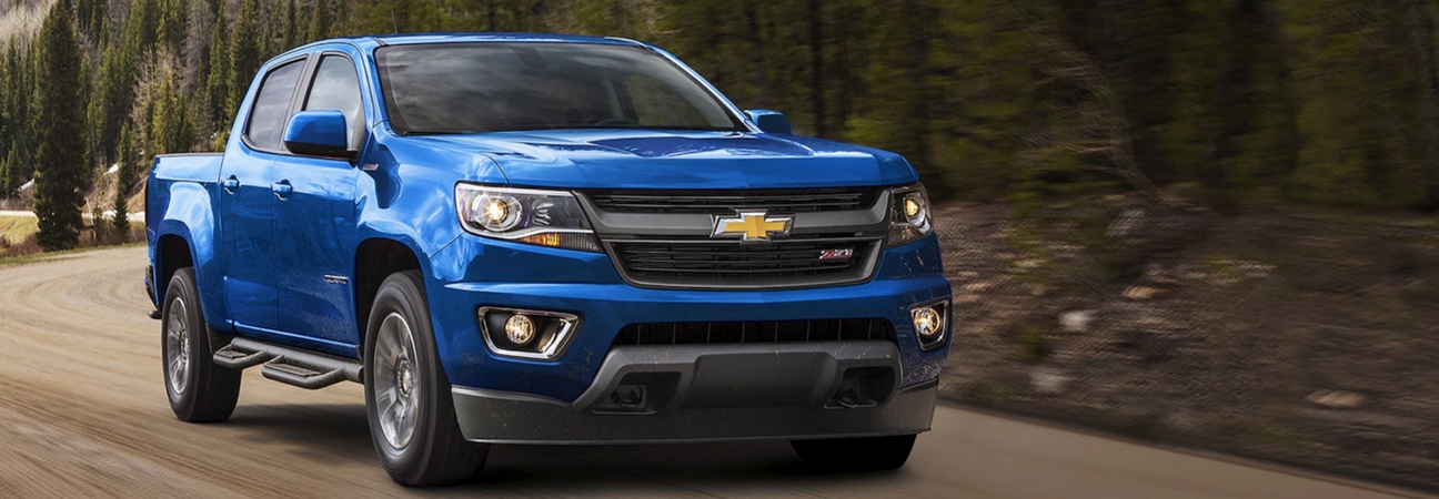 A 2018 Chevrolet Colorado on a dirt road featured in a blog post about a Colorado for sale